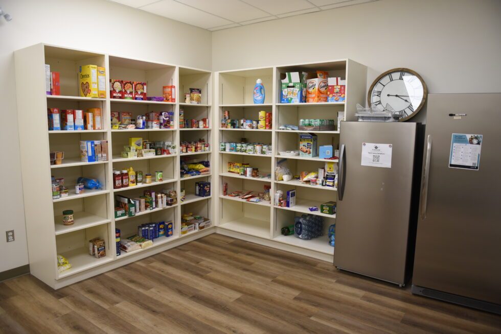 The Elmwood Youth Pantry, with shelves stocked with food and household essentials